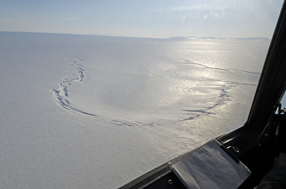 Photo of the ice surface depression or sink hole on Flade Ice Cap ESPO