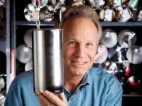 UC Irvine professor Donald Blake, a pioneer in collecting air samples and an expert in analytical atmospheric chemistry, displays an air collection canister in his lab at UCI last week. Blake is studying how air pollution affects greenhouse gases in the global atmosphere. (Photo by Leonard Ortiz, Orange County Register/SCNG)