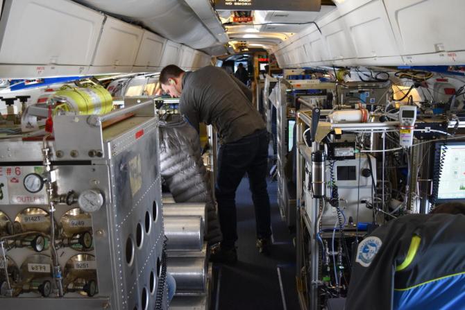 A DC8 packed with atmospheric sensors and samplers is making four laps around the globe. Britt Stephens is among the scientists on the current leg. CREDIT CRAIG LEMOULT / WGBH