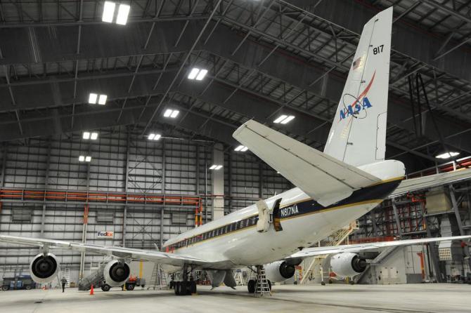 NASA’s DC-8 flying laboratory is parked inside the FedEx hangar as scientists and mission personnel tend to instruments during a stop in Anchorage on Tuesday while on a 28-day round-the-world Atmospheric Tomography (ATom) mission. (Bill Roth / Alaska Dispatch News)