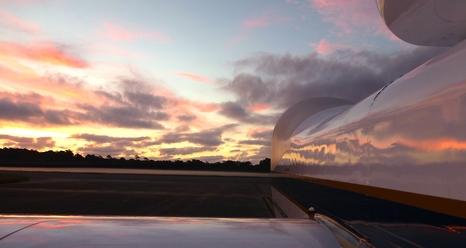NASA Global Hawk No. 872 is pictured on the ramp after landing at NASA's Wallops Flight Facility, Virginia, at sunrise following its 10th and final science flight Sept. 28 – 29 in the agency's 2014 Hurricane and Severe Storm Sentinel (HS3) mission over the Atlantic Ocean.