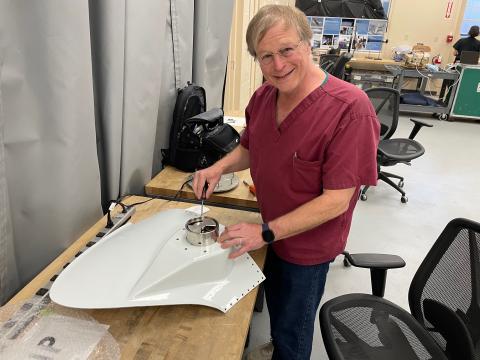 Monte Bateman installing a Lightning Instrument Package (LIP) sensor into ER-2 fairing.