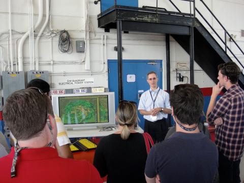 Scott Braun showing images of Hurricane Isaac to Congressional Staffers (2012)