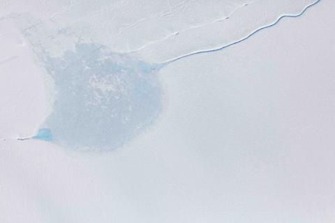 Frozen melt pond close to the ice edge, close to Kangerlussuaq