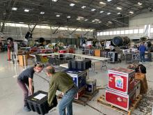 Offloading the truck and setting up the work space. 