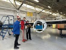 CAPS Team testing instrument on aircraft 