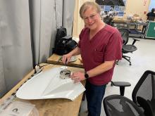 Monte Bateman installing a Lightning Instrument Package (LIP) sensor into ER-2 fairing.