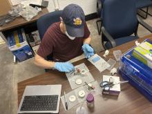 David Verbart Loads Substrates for the MOUDI Instrument in Preparation for Science Flight #1