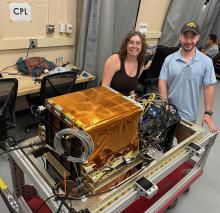 Jennifer Moore and Grant Finneman with the Cloud Physics Lidar (CPL)