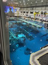 2026 SABRE Tropics: Neutral Buoyancy Lab Pool with Simulated Moon Surface on the Right and ISS Mockup on the Left