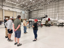Nicki Reid giving a tour of the ER-2 to MTANG ATC