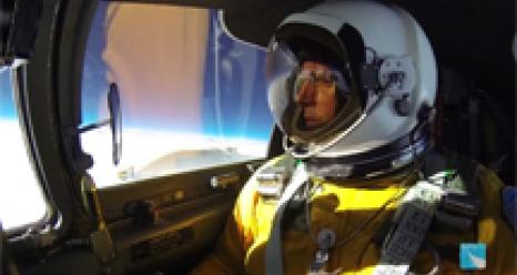 ER-2 pilot in cockpit at 70K ft