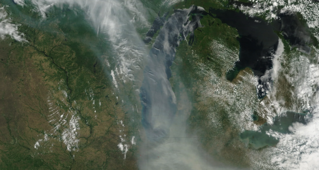 Smoke from Canadian wildfires drifts slowly south over the United States’ Midwest. The drifting smoke can be seen in this Terra satellite image taken in December 2017 over Lake Michigan, as well as parts of Minnesota, Wisconsin, Indiana, and Ohio. NASA MODIS Rapid Response Team / Jeff Schmaltz